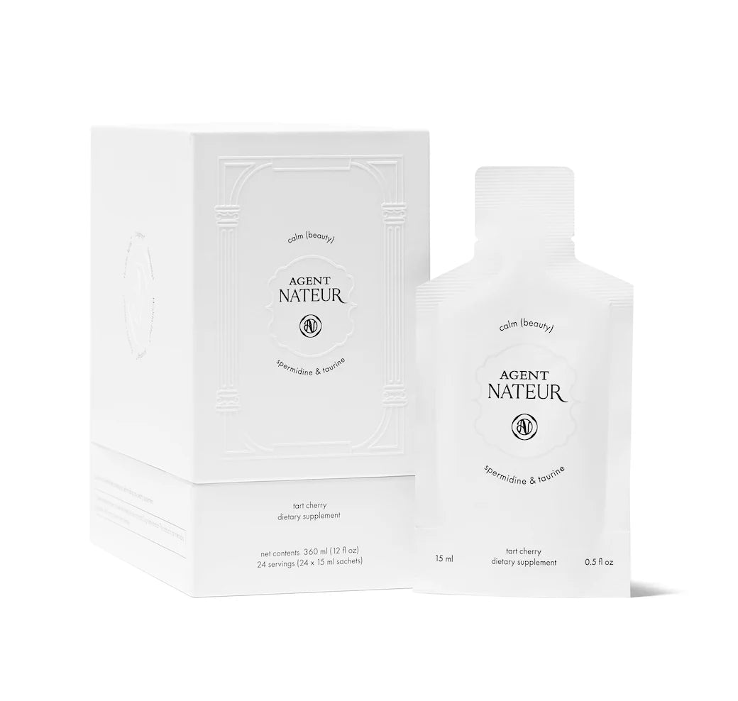 A white bottle with a label reading 'AGENT NATEUR', next to a white box with the same label